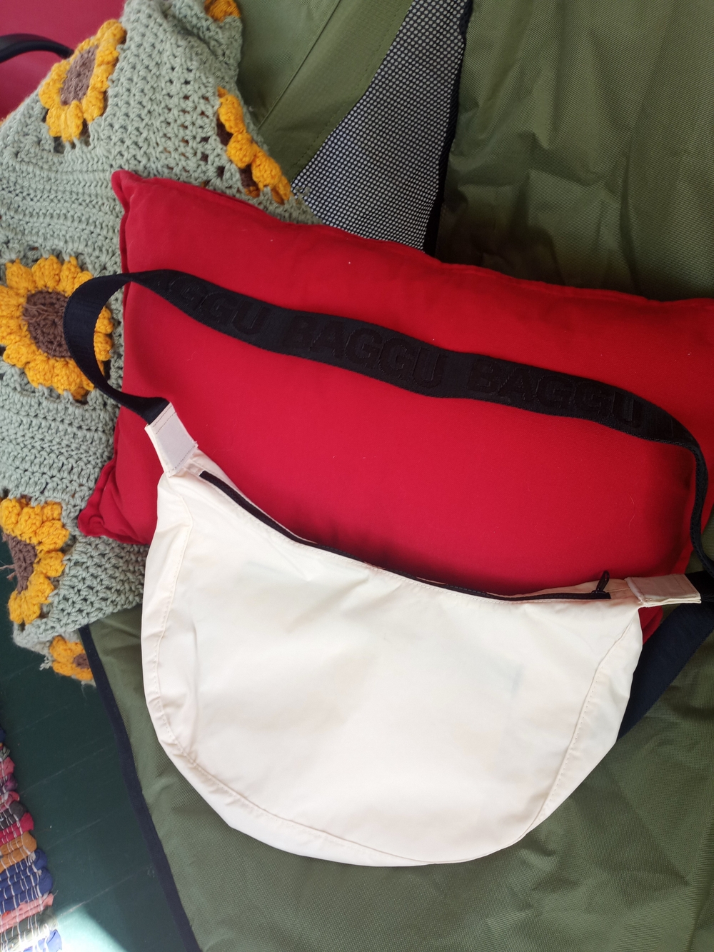 BAGGU Crescent Sling Bag in Cream with Black Strap